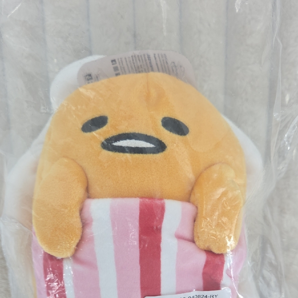 Gudetama Plush Toy in Yellow with Pink Striped Blanket
